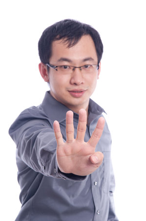 Young asian male model with hand gesture in business shirtの写真素材