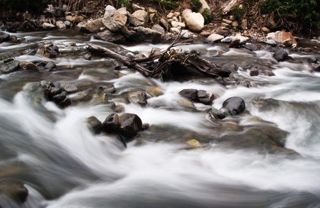 natural water flow in moutain jungle riverの写真素材