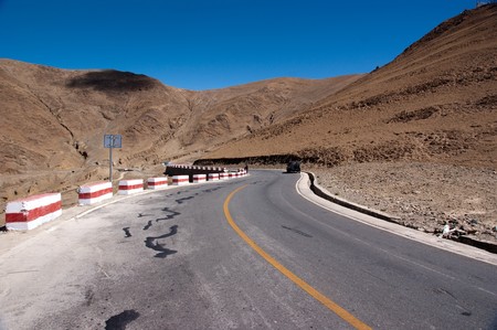 yellowish mountain road view in tibet of Chinaの写真素材