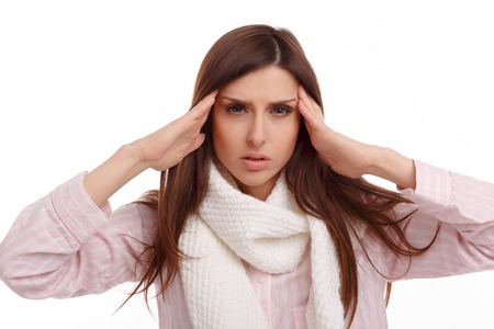 Young woman fell ill and holding his head. Sick Woman, flu. Headache. Virus .Medicinesの写真素材