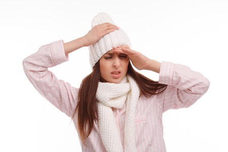 Young woman fell ill and holding his head. Sick Woman, flu. Headache. Virus .Medicinesの写真素材