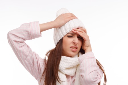 Young woman fell ill and holding his head. Sick Woman, flu. Headache. Virus .Medicinesの写真素材