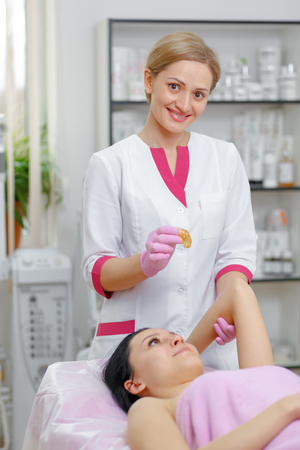 Portrait, Master Cosmetologist by sugar hair removal in beauty salonの写真素材