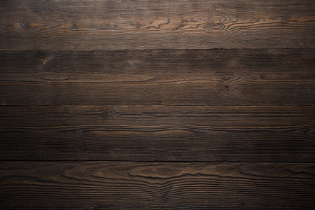 Dark wood background brown color. Close up of wall made of wooden planks