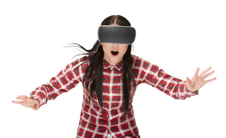 Shocked woman in VR playing and traveling in cyberspace.の写真素材