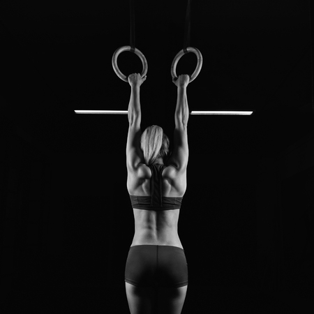 Female fitness athlete exercisingの写真素材