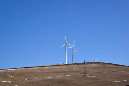 Wind turbines on empty landの写真素材
