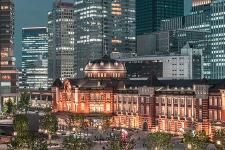 Night view of Tokyo cityscape in front of Tokyo Railway Station, the biggest and busiest railway station in Japan.の写真素材