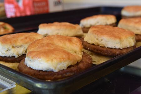 Sausage Breakfast Sandwiches for sale on bakery trayの写真素材