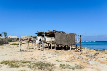 Fishing hut typical of the Es Pujols Beach, island of Formentera, Spain, September 25, 2017のeditorial素材