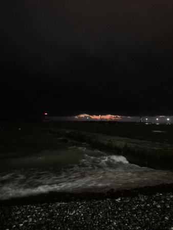 Night thunderstorm sky over the seaの写真素材