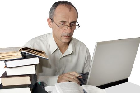the person in eyeglasses works with the laptopの写真素材