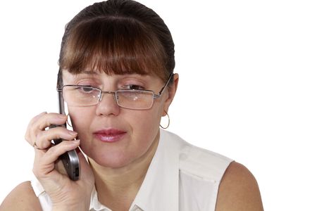 nice woman average years talks by a mobile phoneの写真素材