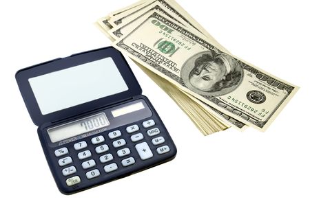 calculator and a bundle of hundred-dollar billsの写真素材