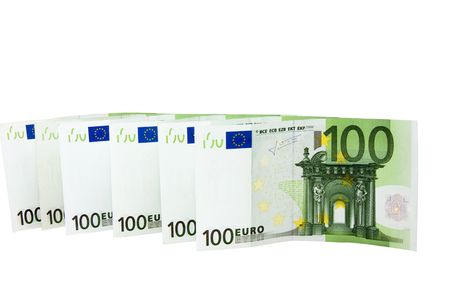 line of hundred  Euro banknotes isolated on white backgroundの写真素材