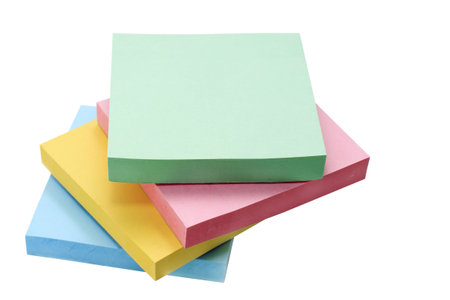 four pile colored paper for notes