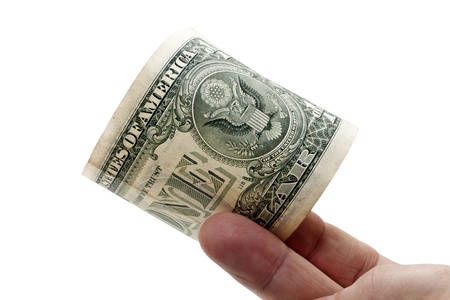 one dollar banknote in a fingersの写真素材