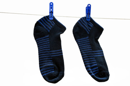 socks are drying on the clothesline