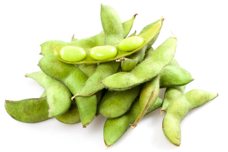 boiled green soy beans, vietnamese beans on white background