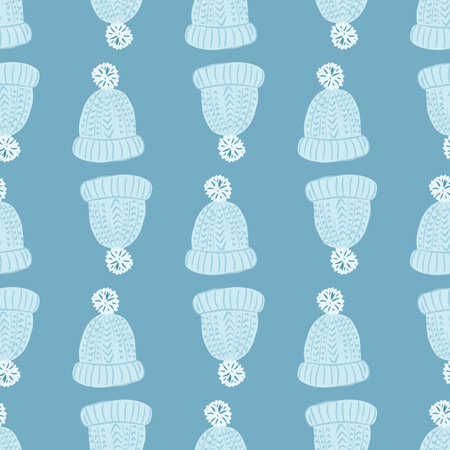 Winter seamless pattern with accessory hat ornament. Blue palette cozy artwork. Graphic design for wrapping paper and fabric textures. Vector Illustration.のイラスト素材