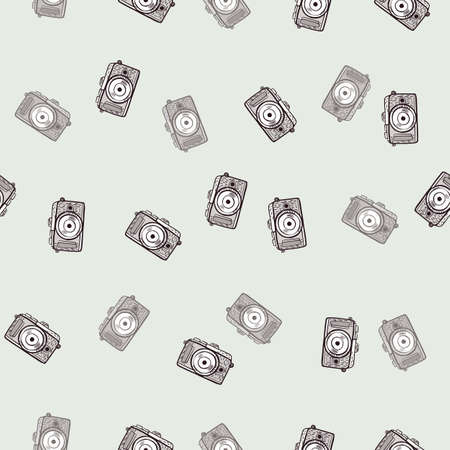 Photo camera seamless pattern. Cute vintage cameras background. Repeated texture in doodle style for fabric, wrapping paper, wallpaper, tissue. Vector illustration.のイラスト素材