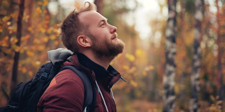 Man Enjoying Nature Hike, Autumn Forest, Adventure, Outdoor, Relaxation, Backpacking.の素材