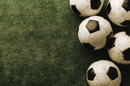 Cluster of Soccer Balls on Grass Perfect for Sports and Athletic Themes.の素材