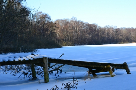 Picture of a defective bridge covered with snowの写真素材