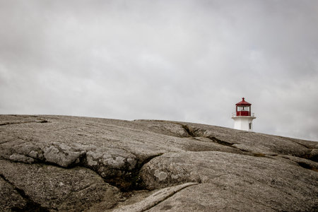 Light house at Peggy's Cove, Nova Scotia, Canada on a cloudy day