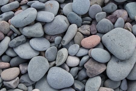 close up of pebbles and rocks on the beach in Atlantic, Canadaの写真素材