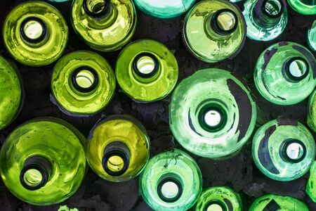 close up of green glass bottles patternの写真素材