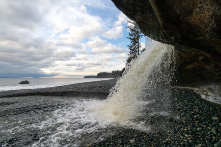 waterfall on the beach on Vancouver Island, British Columbia, Canada