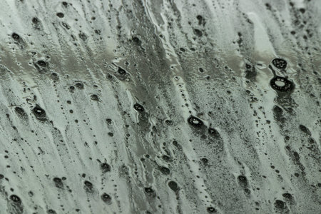 soap and water on the windsheld going through an automated car wash