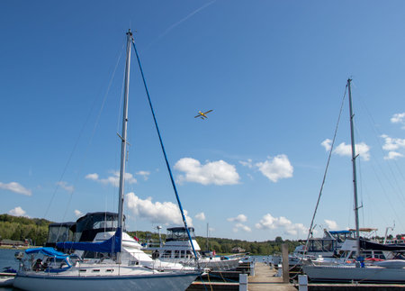 Manitoulin Island, Ontario, Canada - August 2, 2021: Pleasure boats moored in the marina in the town...