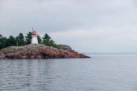 Killarney Lighthouse in Killarney, Ontario on a foggy morning in Canada on Georgian Bayの写真素材