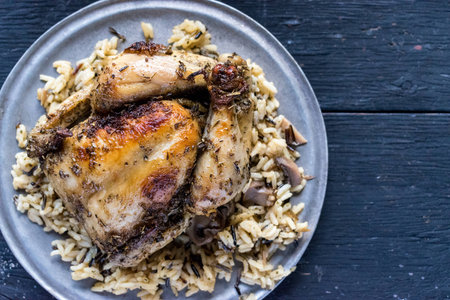 baked chicken dinner with wild riceの写真素材