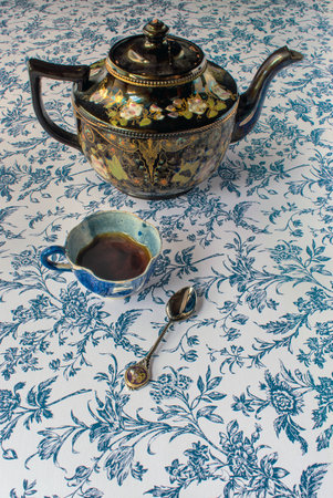 coffee on blue flower pattern tableの写真素材