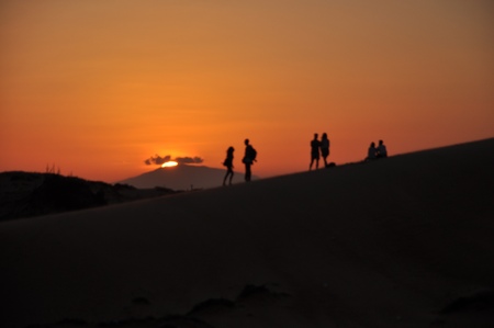 Silhouette of Sunset in Red Sand Dunes, Mui Ne, Vietnamの写真素材