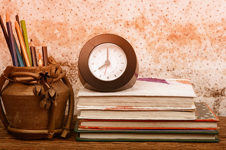 hardback books on wooden table. Back to school. Copy spaceの写真素材