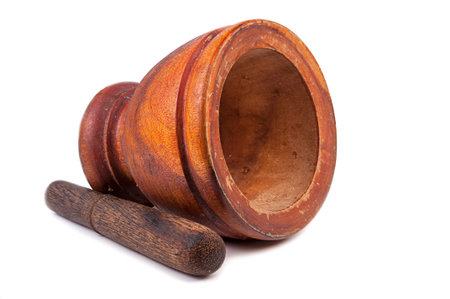 Wood mortar and pestle on white backgroundの写真素材