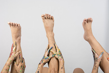 Top View Bare Foot Between  Woman and young boy on white background.の写真素材