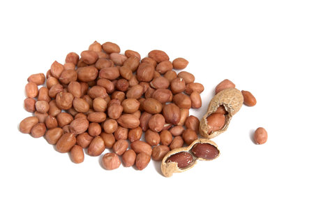 Heap of peanuts isolated on a white background.