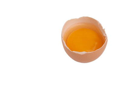 Broken egg isolated on a white background.