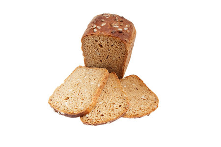 Rye bread full of seeds isolated on a white background.