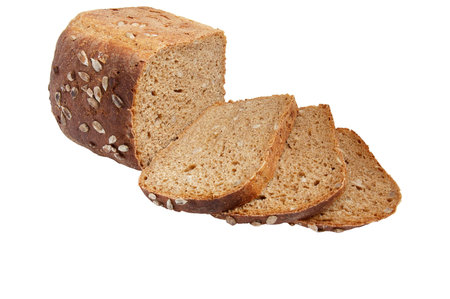 Rye bread full of seeds isolated on a white background.