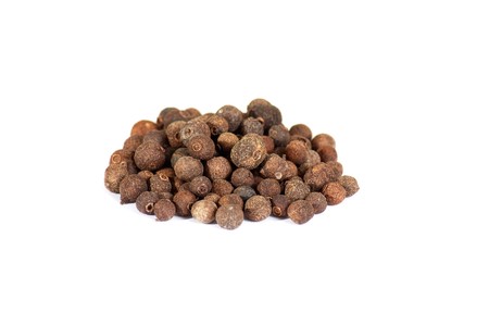 Spices: pile of allspice isolated on the white backgroundの写真素材