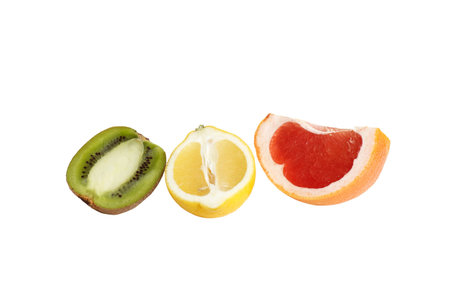 Juicy pieces of lemon,kiwi and grapefruit isolated on a white background.の写真素材