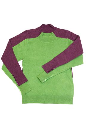 Green and maroon sweaters isolated on a white background.の写真素材