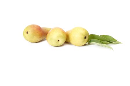 Three ripe pears isolated on a white background.の写真素材