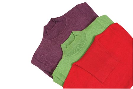 Three modern winter sweaters  isolated on a white backgroundの写真素材